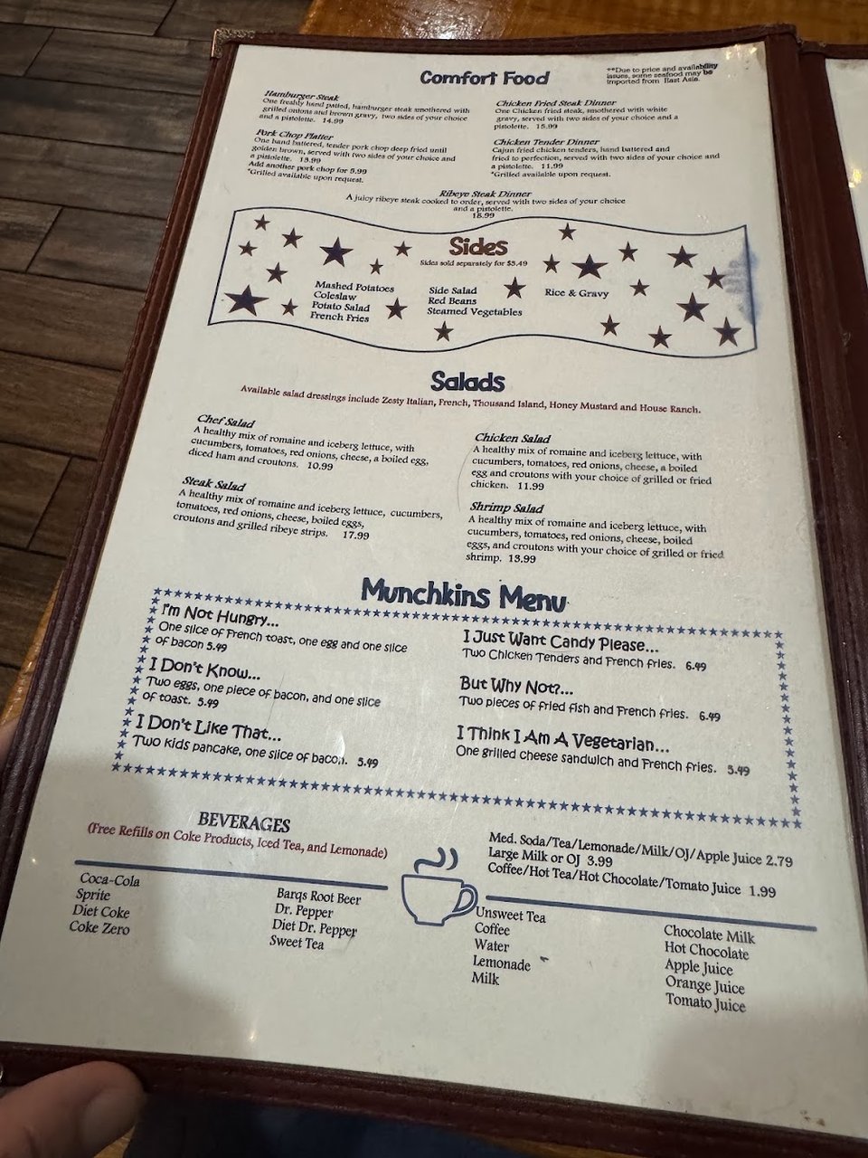 Printed menu with omelettes and waffles.